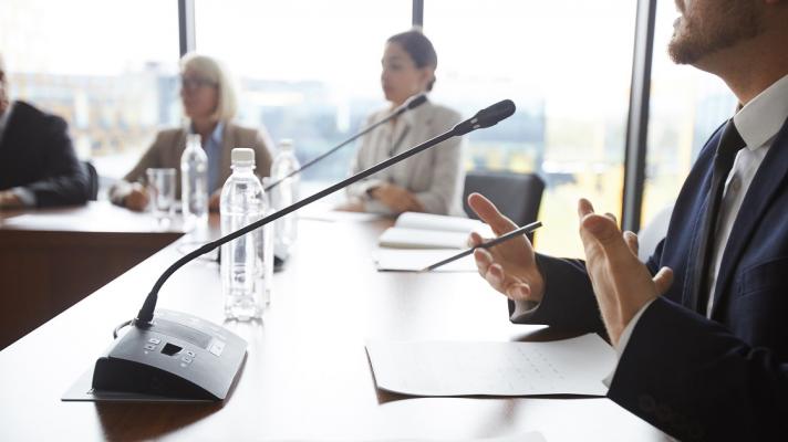 people discussing in a conference room