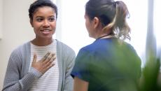 Healthcare worker talking to patient