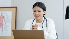 Female doctor at laptop 