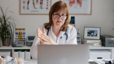 A doctor in a virtual call with a patient