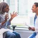 Patient talking to doctor