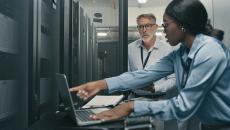 Workers in data center_sponsored partner feature_Getty-Marco VDM